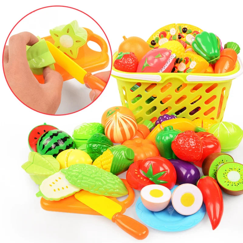 A colorful pretend play kitchen set featuring plastic fruit and vegetable cutting tools and food items.