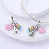 Silver heart charm bead with pink zircon and Eiffel Tower pendant on a silver chain