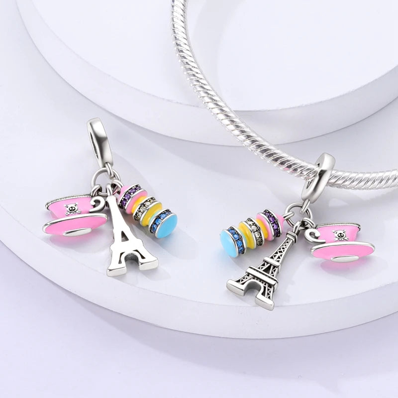 Silver heart charm bead with pink zircon and Eiffel Tower pendant on a silver chain