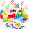 A collection of colorful stacking game blocks and a game card demonstrating how to build shapes.