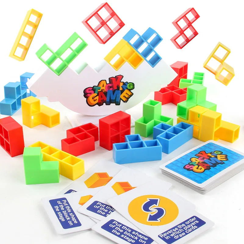 A collection of colorful stacking game blocks and a game card demonstrating how to build shapes.