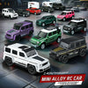 A collection of various colored and styled mini alloy RC cars displayed on a dark surface.