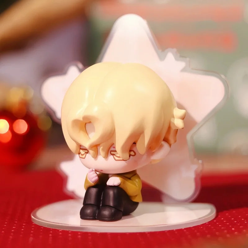 A small, light blonde miniature figure collectible with pink hair and glasses is displayed against a translucent star backgro