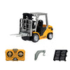 A yellow mini remote control excavator toy with a silver bucket and various attachments.