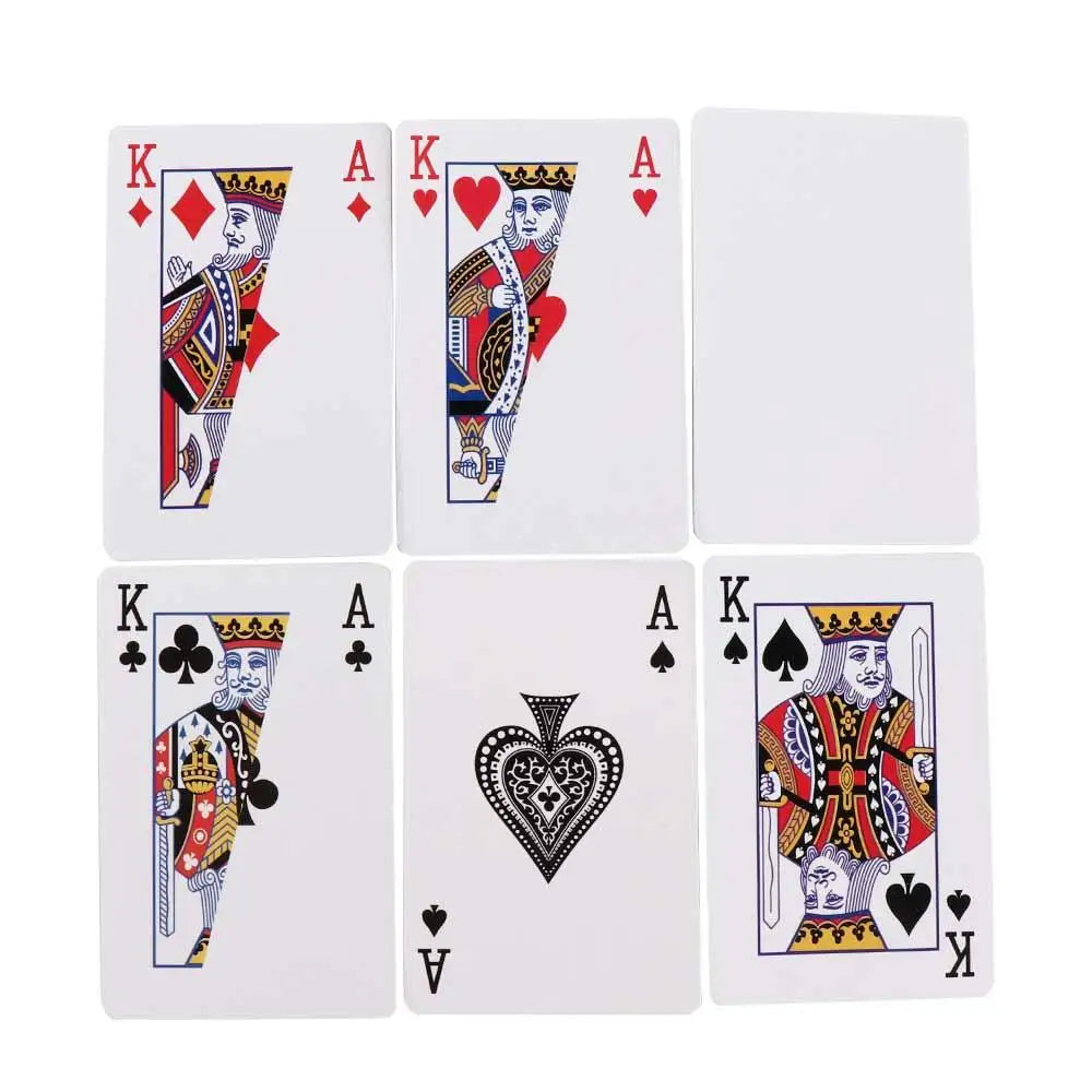 A set of playing cards showing King and Ace of various suits, used for a beginner magic kit.
