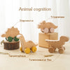 Wooden dinosaur toy cars representing different dinosaur species like Stegosaurus and Tyrannosaurus Rex for animal cognition