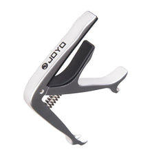 Silver zinc alloy guitar capo with a black plastic body and metal hinge