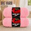 A pair of bright pink Knitnex super soft acrylic yarn skeins for knitting and crochet.