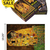 A box of a 1000-piece MaxRenard Kiss jigsaw puzzle showing the finished artwork and package details.
