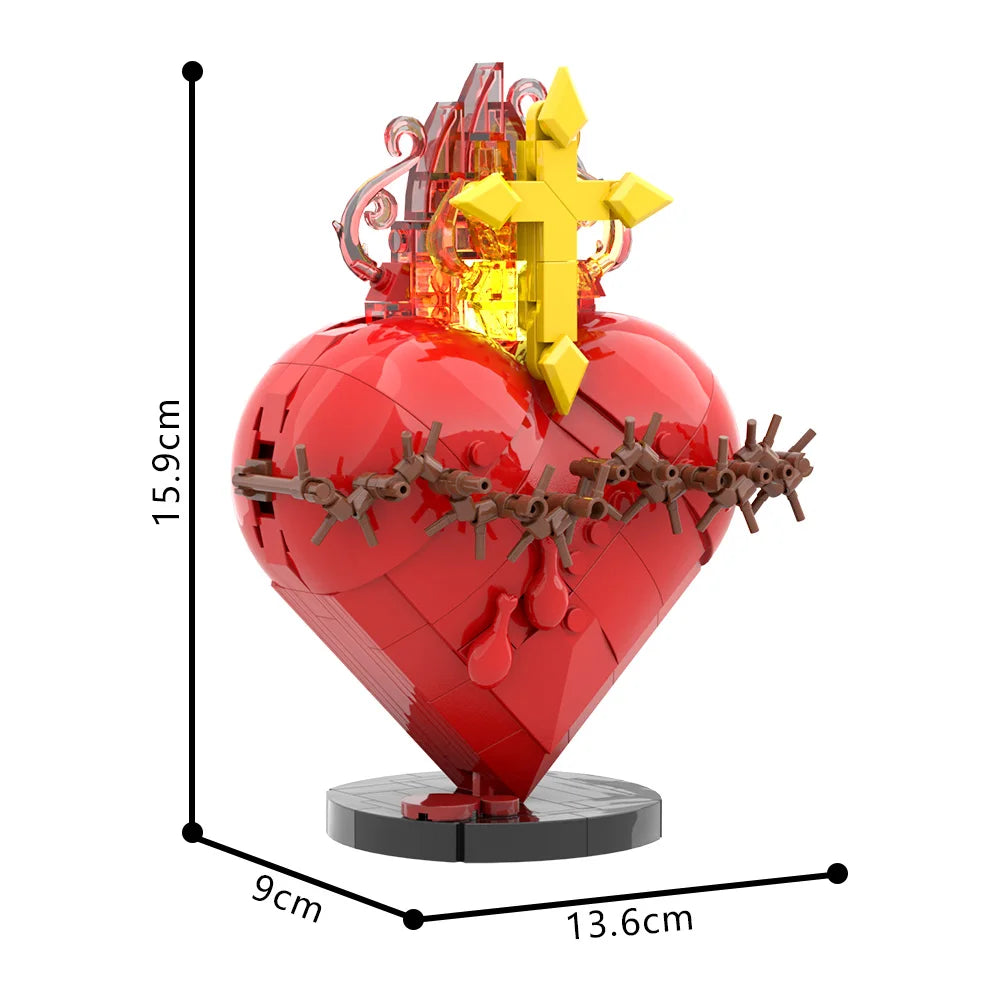 A red heart shaped building block set featuring a golden cross on top.