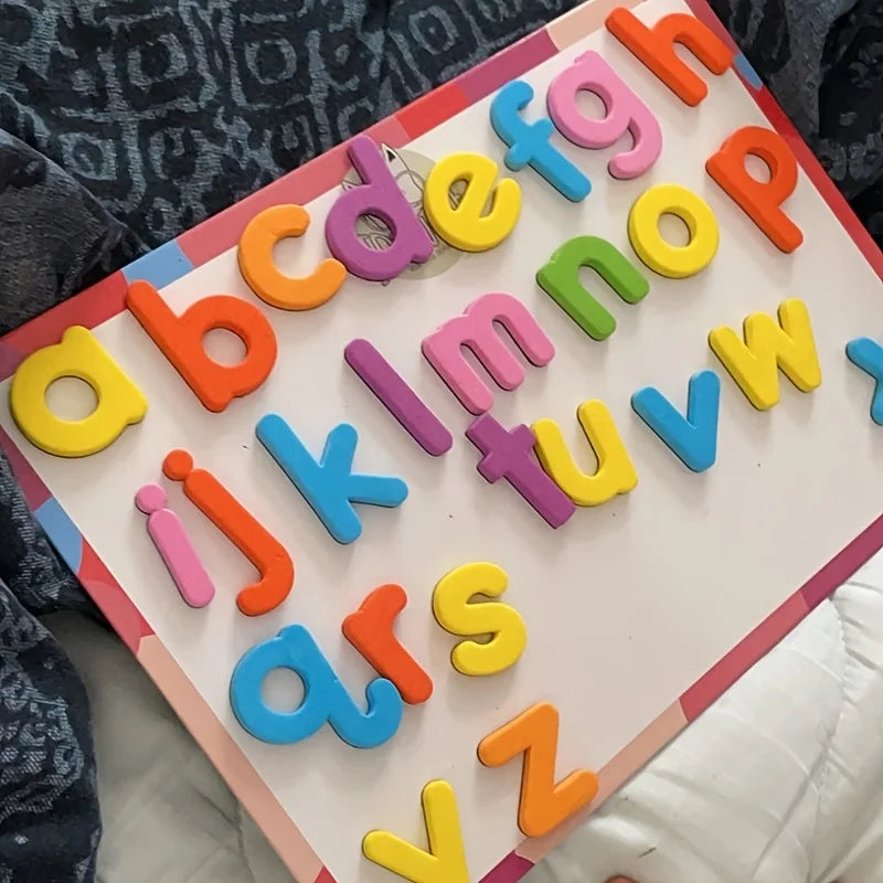 A colorful magnetic letter set showing the alphabet from a to z arranged in rows.