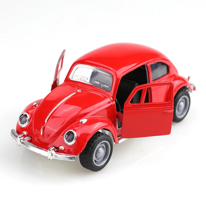 A red 1:38 die-cast model of a classic Beetle car with the door open.