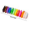 Une rangée de couleurs de pâte à modeler sèche disposées en ligne avec une échelle de mesure.