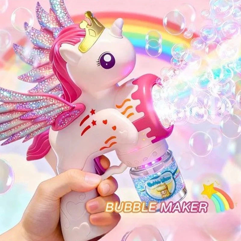 A hand holds a pink unicorn bubble maker emitting colorful light and bubbles.