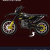 A black KTM dirt bike model demonstrating the ability to lower or lift the front wheel.