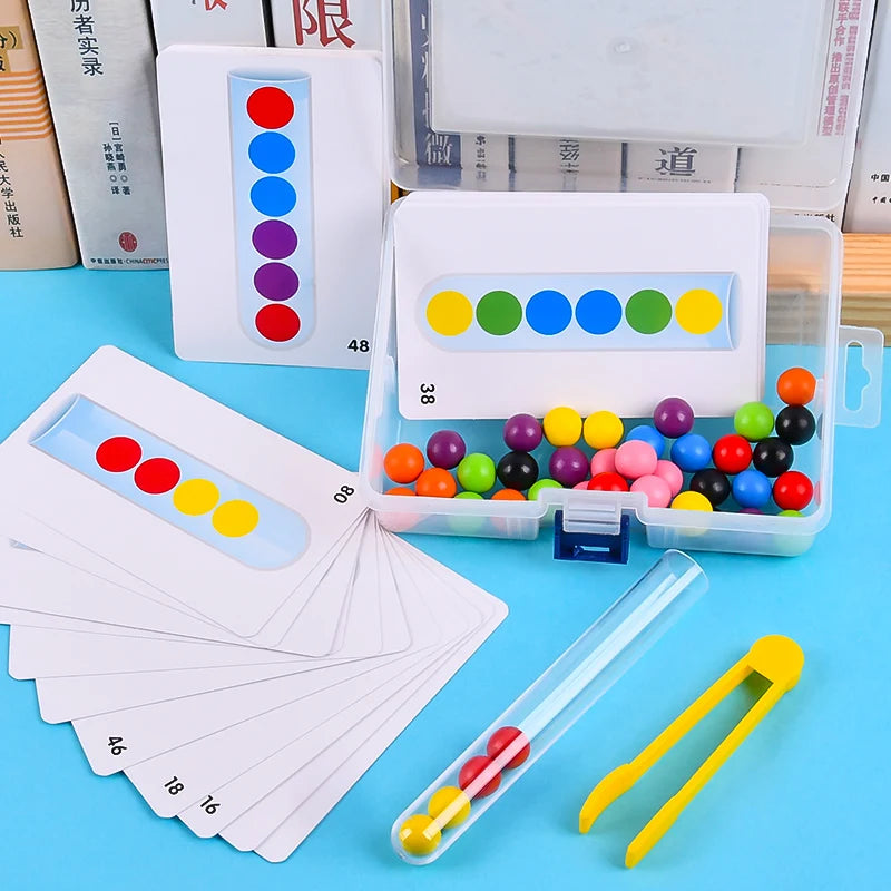 A set of Montessori wooden clip beads game with colored beads and a clear plastic tool is displayed on a blue surface.