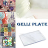 A collection of printed art on silicone plates, including floral and portrait designs.