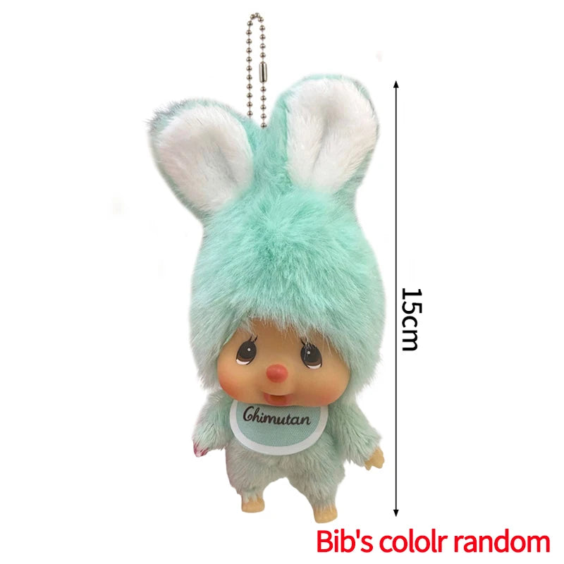 A light blue bunny plush cartoon charm with fluffy ears and a name tag.