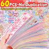 A hand holds a fan of colorful kawaii cartoon stickers for DIY crafts and journaling