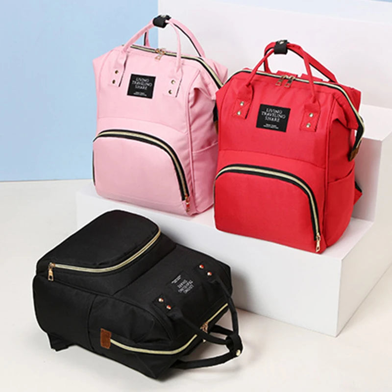 Canvas Baby Diaper Bag with Thermal Bottle Pockets & Hanging Design