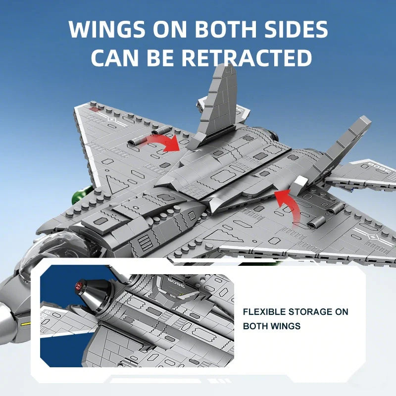 A close-up of a gray fighter jet model kit showing wings that can be retracted on both sides.