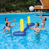 Five people playing water volleyball in a pool with a yellow inflatable net and ball