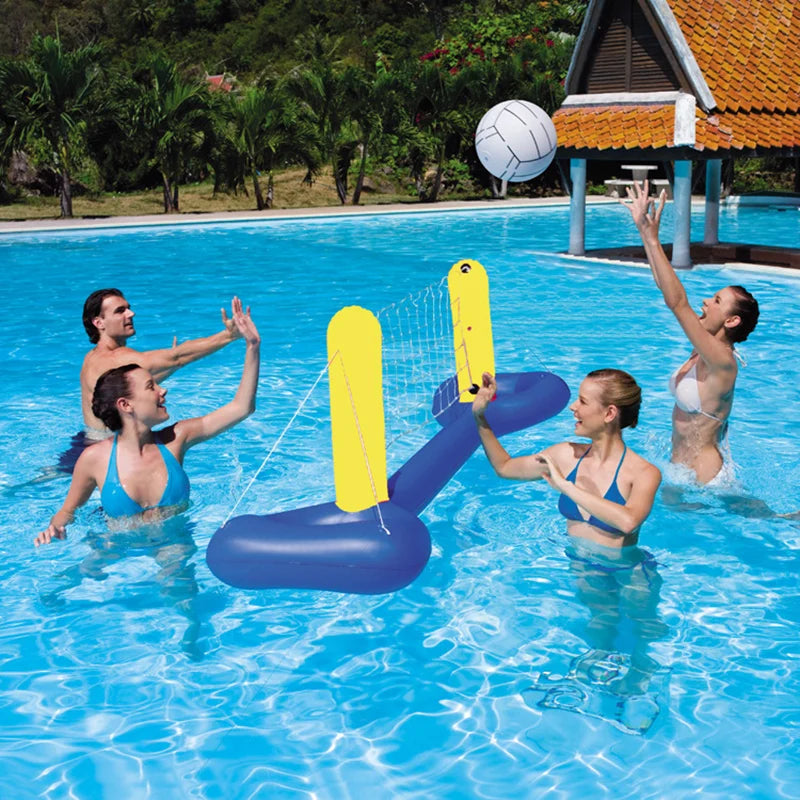 Five people playing water volleyball in a pool with a yellow inflatable net and ball