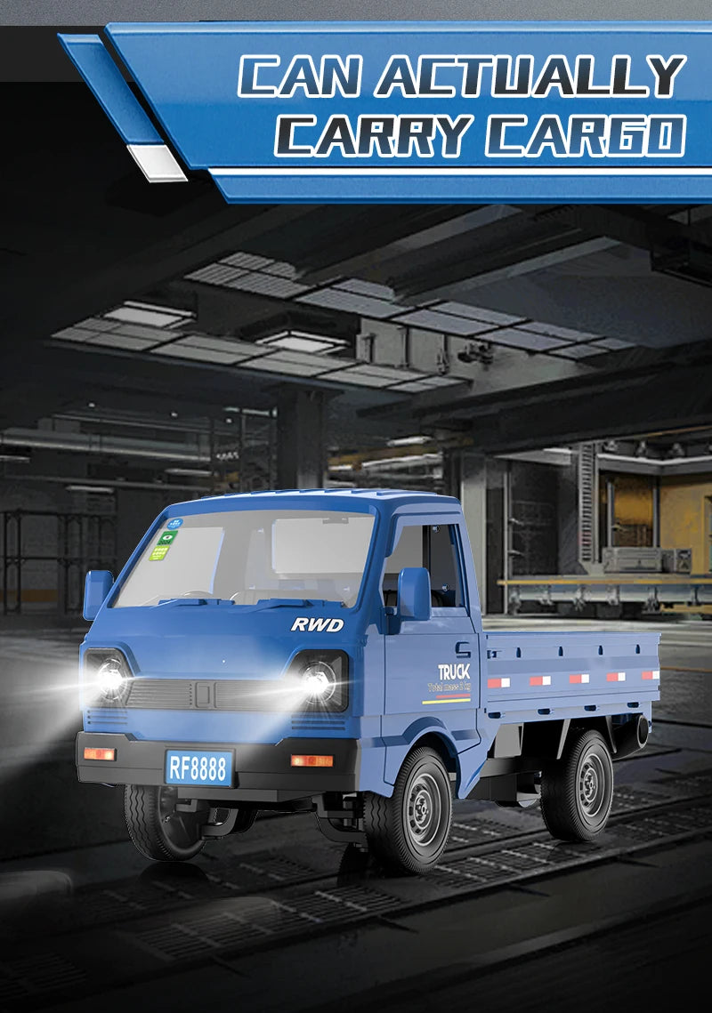 A blue 1:16 scale 4WD RC truck is shown driving on train tracks in a warehouse setting.