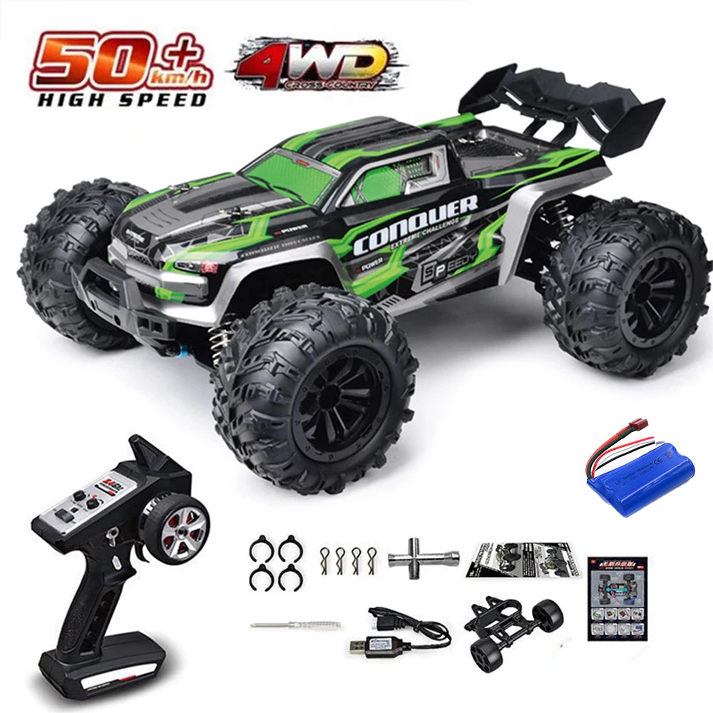 A green and black 4WD monster truck RC car with large tires and accessories shown on a white background.