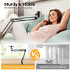 A woman is using a flexible gooseneck arm tripod with a phone mount for support.