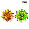 Two colorful expandable magic ball toys, one red and yellow, and one green and purple.