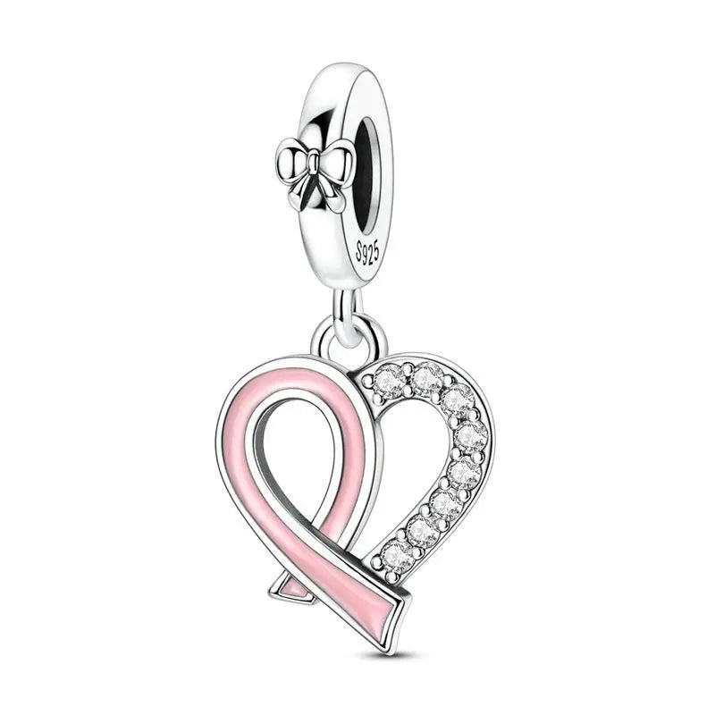 A silver heart charm bead featuring a pink enamel design and clear zirconia stones.