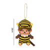 A cute Monchhichi plush keychain with black and yellow stripes, hanging from a gold chain.