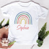 White t-shirt featuring a rainbow graphic and the name Sophie printed on the front