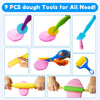 A set of nine silicone dough tools including a rolling pin, cutters, and extruder for baking or crafting.