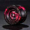 A close-up view of a black aluminum alloy yo-yo with red accents and a glossy finish.