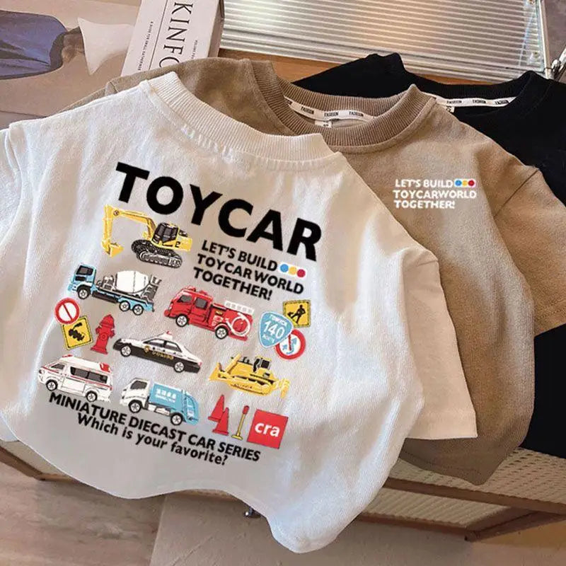 White crew neck t-shirt featuring a graphic print of various diecast toy cars.