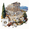 An artistic wooden jigsaw puzzle depicting the ruins of the Parthenon on a hill with surrounding landscape.