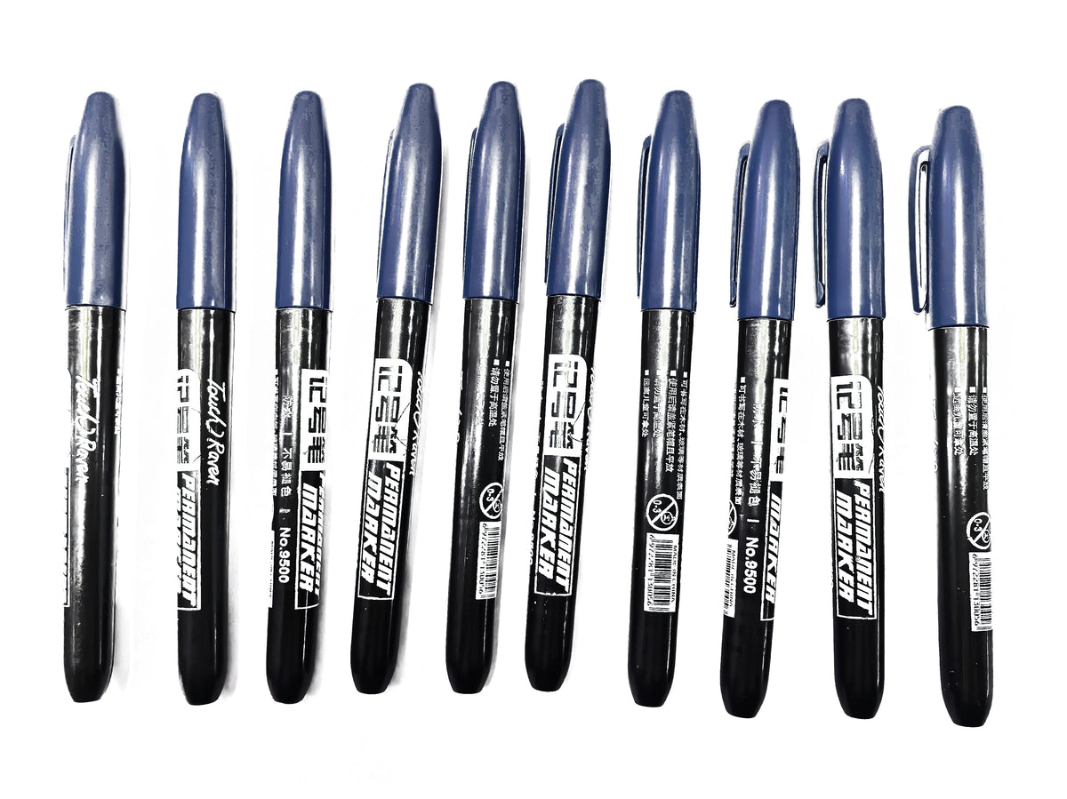 A pack of six blue permanent fine-tip markers standing upright in a row.