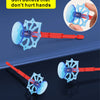 An orange and blue superhero spider web shooter kit with soft bullets designed not to hurt hands.