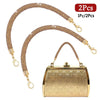 Two sparkling rhinestone purse straps with gold clasps shown against a white background.