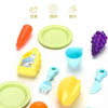 A collection of colorful plastic play dishes and tools for kids, including spoons, cups, and molds.