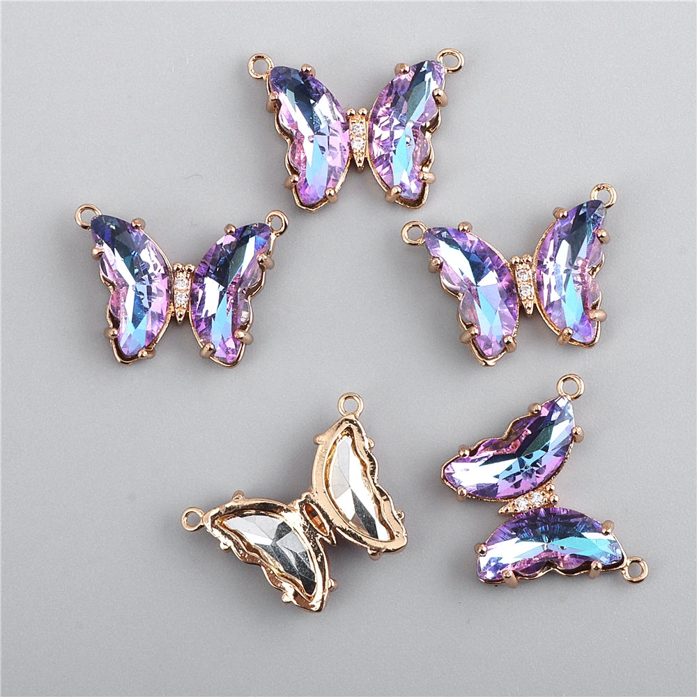 A set of sparkling crystal butterfly charm beads in purple and iridescent tones for jewelry making
