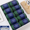 A box of YEDAN MERIN worsted wool thread yarn in green and blue colors for knitting projects.