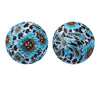 Pair of round silicone beads with a leopard print and teal background for jewelry making