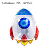 A white foil balloon shaped like a rocket with blue and purple accents and a swirling blue design.