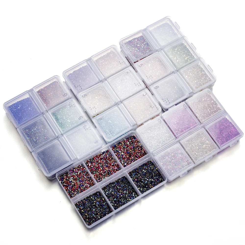 A clear plastic tray filled with various colors of crushed glass stones for resin and craft projects