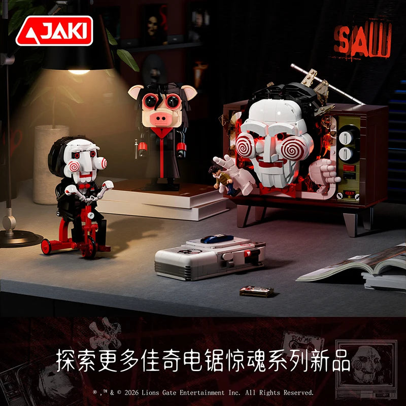 A display featuring a horror movie puppet model building set with a voice recorder and related props.