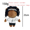 A brown plush doll resembling Eminem, XXXTentacion, and Frank Ocean with black hair and a white shirt.
