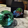 A teal, faceted steel ball fidget toy is displayed in front of a black box labeled Steel Ball Run.